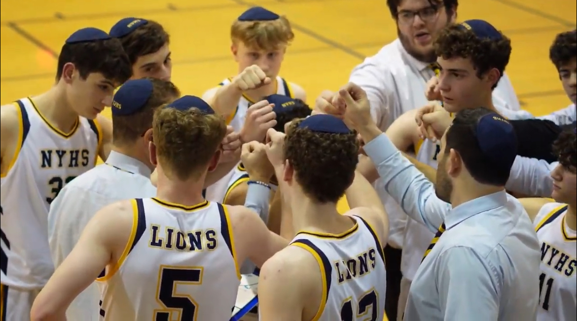 Boys’ varsity basketball team secures a spot in tri-districts