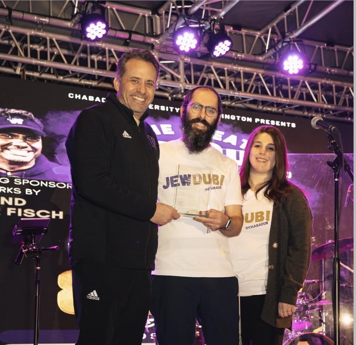 Coach Jeff Fisch, Rabbi Mendel Weingarten and Miriam Weingarten