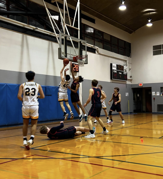 Benjy Weiss grabbing the rebound and finishing strong with a put-back.